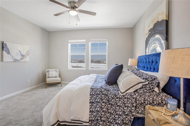 bedroom with ceiling fan and carpet flooring