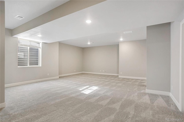 basement with light carpet