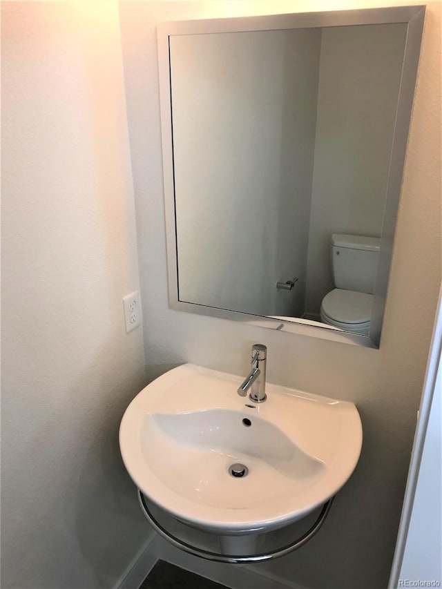 2865 W 24th Ave, Denver, CO 80211 - bathroom with a sink and toilet