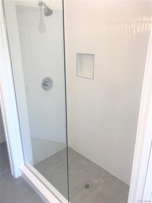 2865 W 24th Ave, Denver, CO 80211 - bathroom with tile patterned flooring and a walk in shower