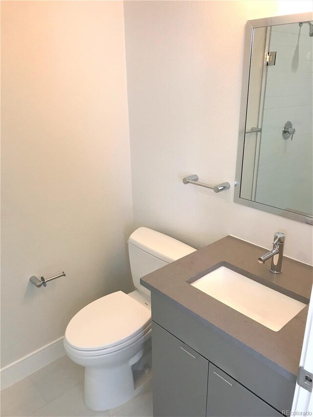 2865 W 24th Ave, Denver, CO 80211 - bathroom with vanity and tile patterned floors