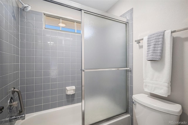 2882 W Long Cir Unit H, Littleton, CO 80120 - bathroom featuring combined bath / shower with glass door