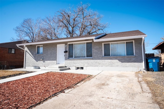 ranch-style home with brick siding