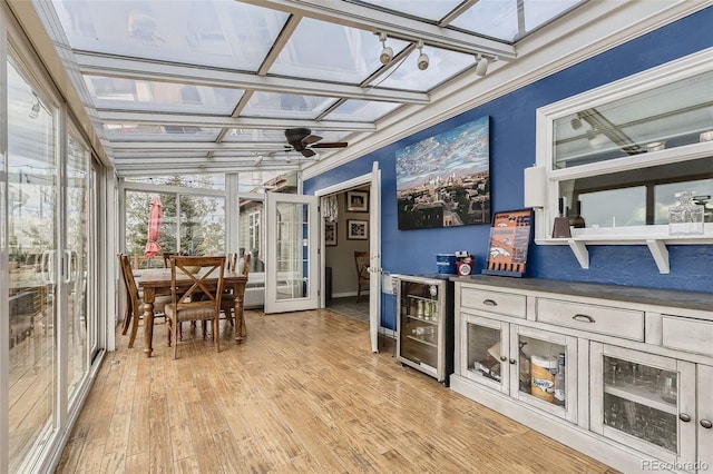 11549 Haskell Creek Rd, Larkspur, CO 80118 - sunroom with beverage cooler and coffered ceiling