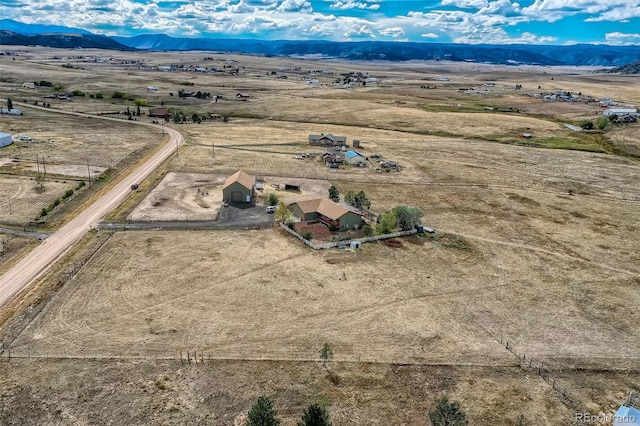 11549 Haskell Creek Rd, Larkspur, CO 80118 - overview of rural landscape featuring a mountain backdrop