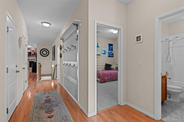 hall featuring light hardwood / wood-style flooring