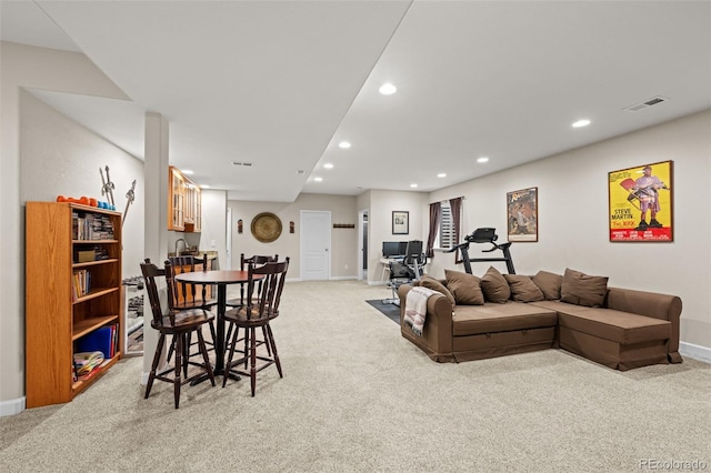 living room with light colored carpet