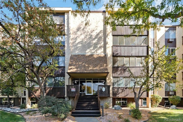 view of building exterior with stairs