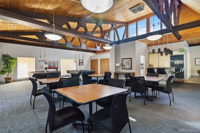 carpeted dining room featuring high vaulted ceiling, wooden ceiling, and beamed ceiling