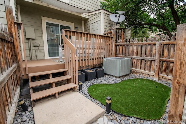 1699 S Trenton St Unit 69, Denver, CO 80231 - view of yard featuring a deck