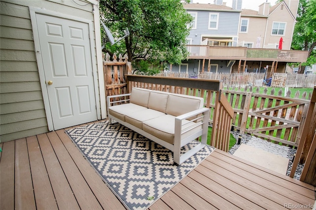 1699 S Trenton St Unit 69, Denver, CO 80231 - deck featuring an outdoor hangout area