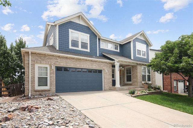4488 Larksong Pl, Castle Rock, CO 80109 - view of front of home with brick siding, driveway, and a garage