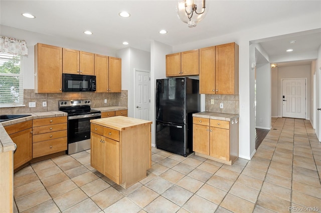 4488 Larksong Pl, Castle Rock, CO 80109 - kitchen featuring black appliances, wooden counters, tasteful backsplash, light tile patterned floors, and recessed lighting