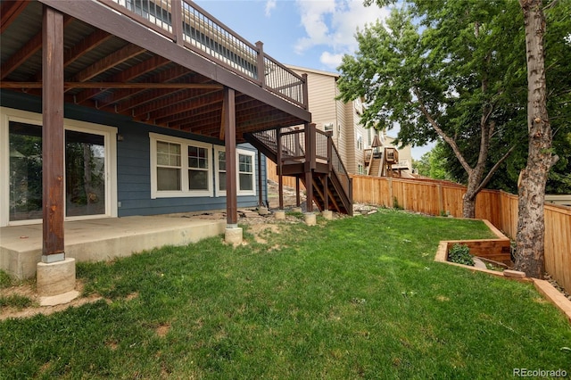 4488 Larksong Pl, Castle Rock, CO 80109 - fenced yard featuring stairway, a deck, and a patio area