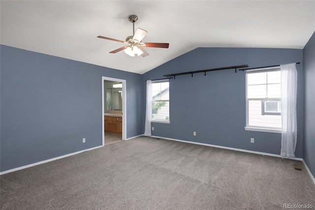 4488 Larksong Pl, Castle Rock, CO 80109 - spare room featuring ceiling fan, lofted ceiling, and carpet floors
