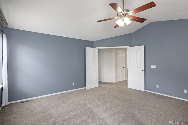 4488 Larksong Pl, Castle Rock, CO 80109 - unfurnished bedroom featuring lofted ceiling, carpet flooring, and a ceiling fan