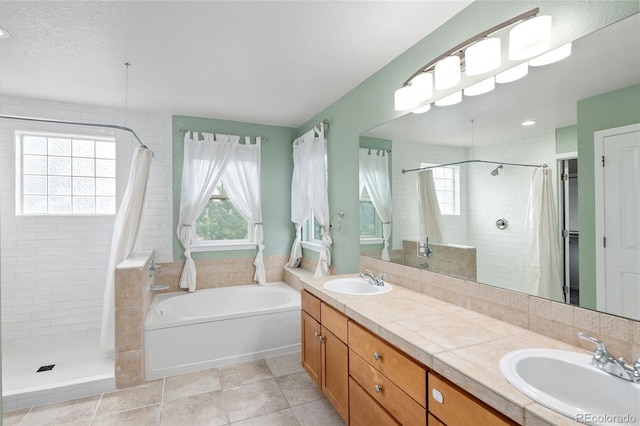 4488 Larksong Pl, Castle Rock, CO 80109 - bathroom featuring plenty of natural light, a shower stall, and a garden tub
