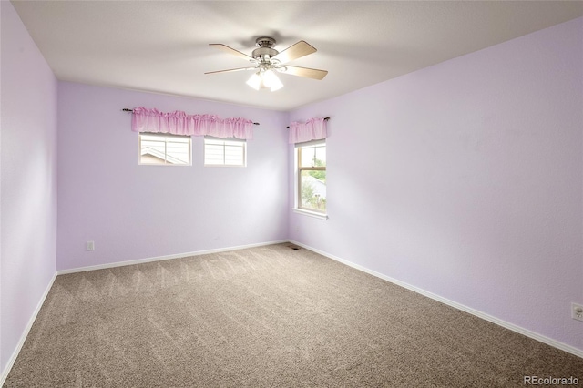 4488 Larksong Pl, Castle Rock, CO 80109 - carpeted spare room with ceiling fan and baseboards