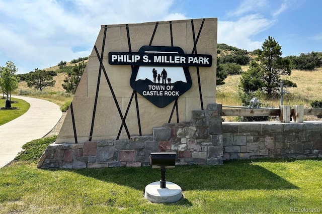 4488 Larksong Pl, Castle Rock, CO 80109 - community sign featuring a yard