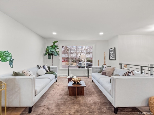 living area with recessed lighting