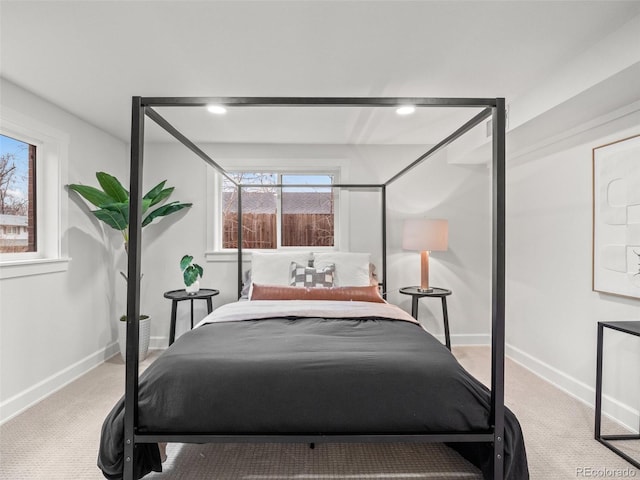 bedroom featuring recessed lighting, baseboards, and carpet floors