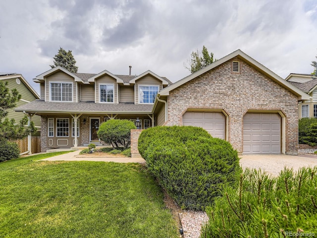 15035 E Grand Ave, Aurora, CO 80015 - view of front facade with a garage, brick siding, driveway, roof with shingles, and covered porch