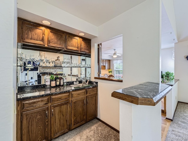 15035 E Grand Ave, Aurora, CO 80015 - indoor wet bar with light carpet and ceiling fan