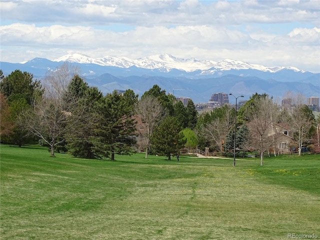 15035 E Grand Ave, Aurora, CO 80015 - surrounding community with a mountain view and a lawn