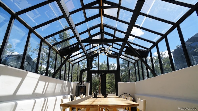 sunroom / solarium with outdoor dining space