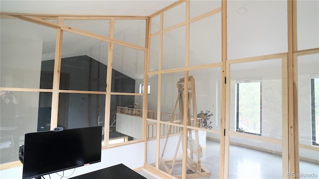 interior space featuring vaulted ceiling