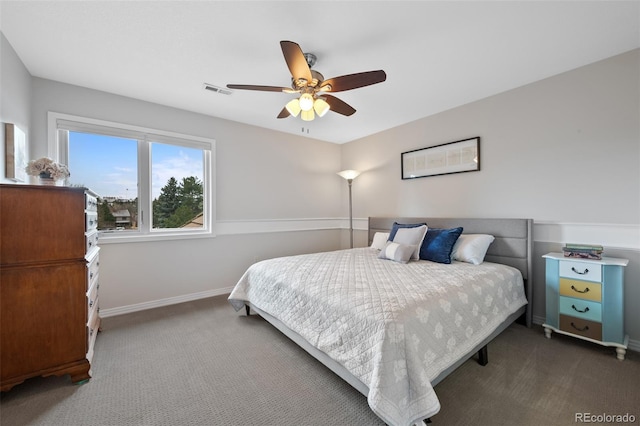 bedroom featuring carpet flooring, ceiling fan, and baseboards