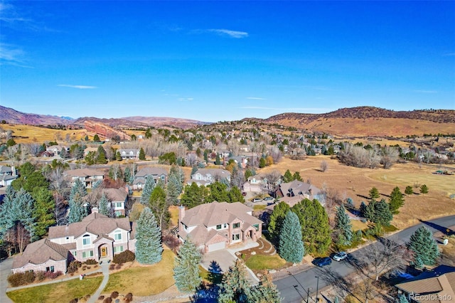 birds eye view of property featuring a residential view and a mountain view