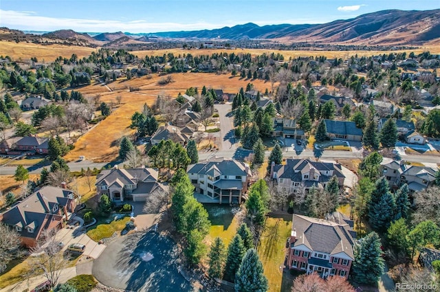 bird's eye view with a residential view and a mountain view