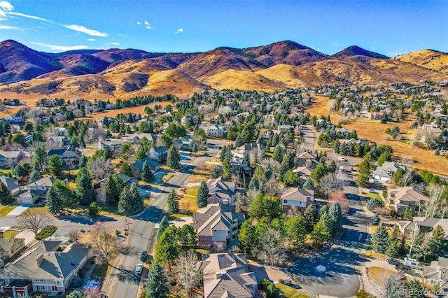 birds eye view of property with a mountain view and a residential view