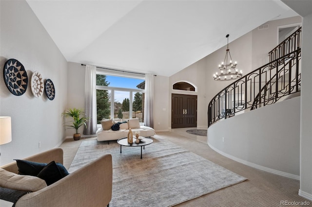 carpeted living area with a chandelier, visible vents, high vaulted ceiling, baseboards, and stairs