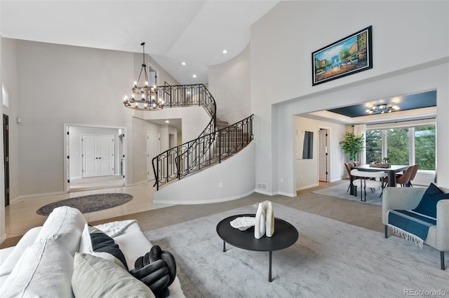 tiled living area featuring stairway, recessed lighting, a towering ceiling, and an inviting chandelier