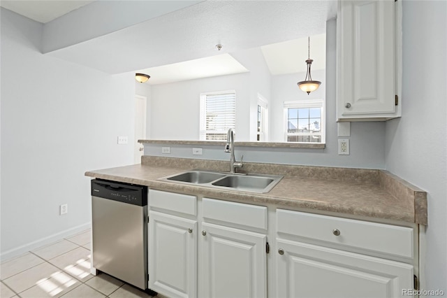 kitchen with sink, dishwasher, white cabinetry, hanging light fixtures, and light tile patterned flooring