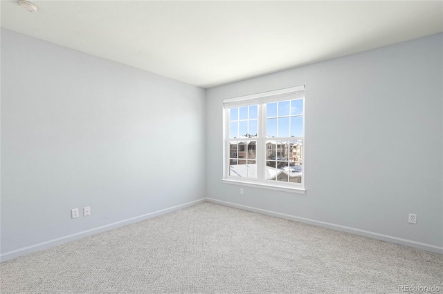 empty room with carpet flooring