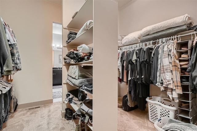 walk in closet with carpet and visible vents