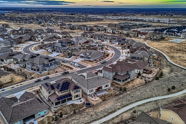 aerial view at dusk with a residential view