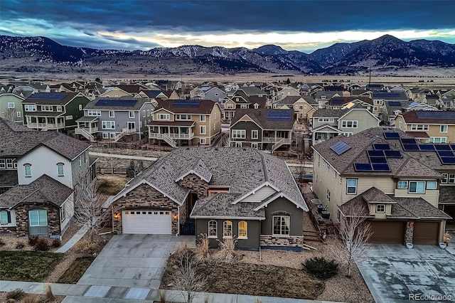 drone / aerial view with a residential view and a mountain view