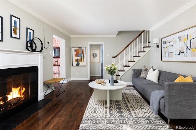 living room featuring dark hardwood / wood-style flooring and crown molding