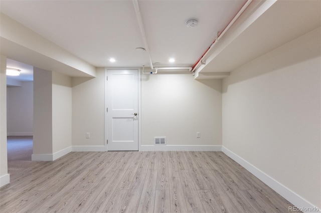 basement with light wood-type flooring