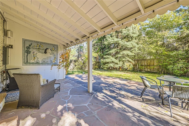 view of patio / terrace featuring electric panel