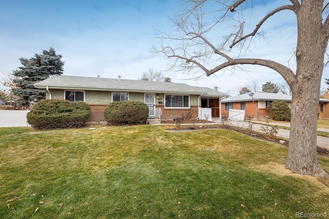 ranch-style house with a front yard