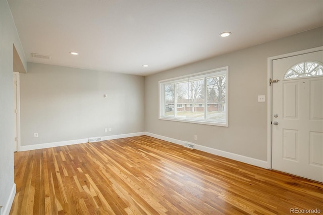 entrance foyer featuring light wood-type flooring