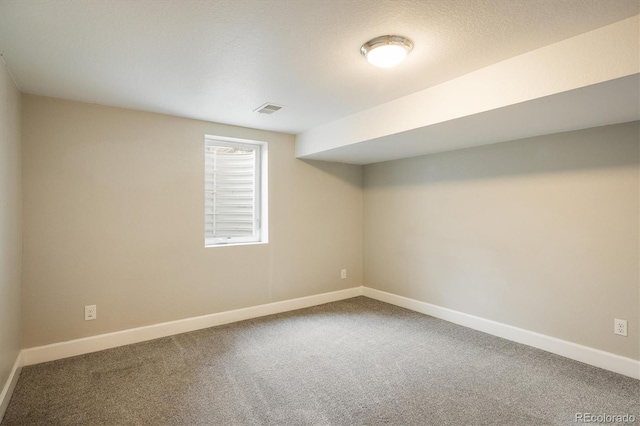 basement featuring carpet flooring