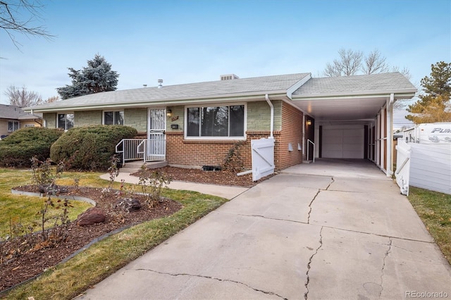 single story home featuring a carport