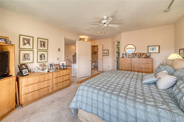 bedroom featuring a ceiling fan and light carpet