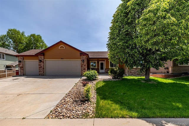 903 Cameron Dr, Severance, CO 80550 - ranch-style home featuring an attached garage, driveway, a front yard, and brick siding